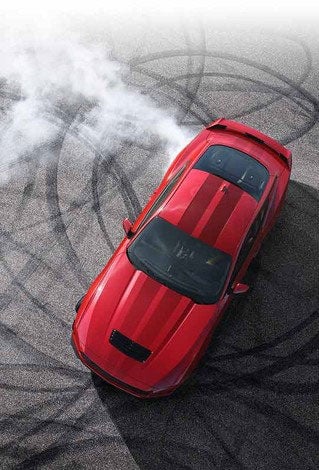 Overhead view of a 2024 Ford Mustang® model with tire tracks on pavement | Coughlin Ford of Circleville in Circleville OH