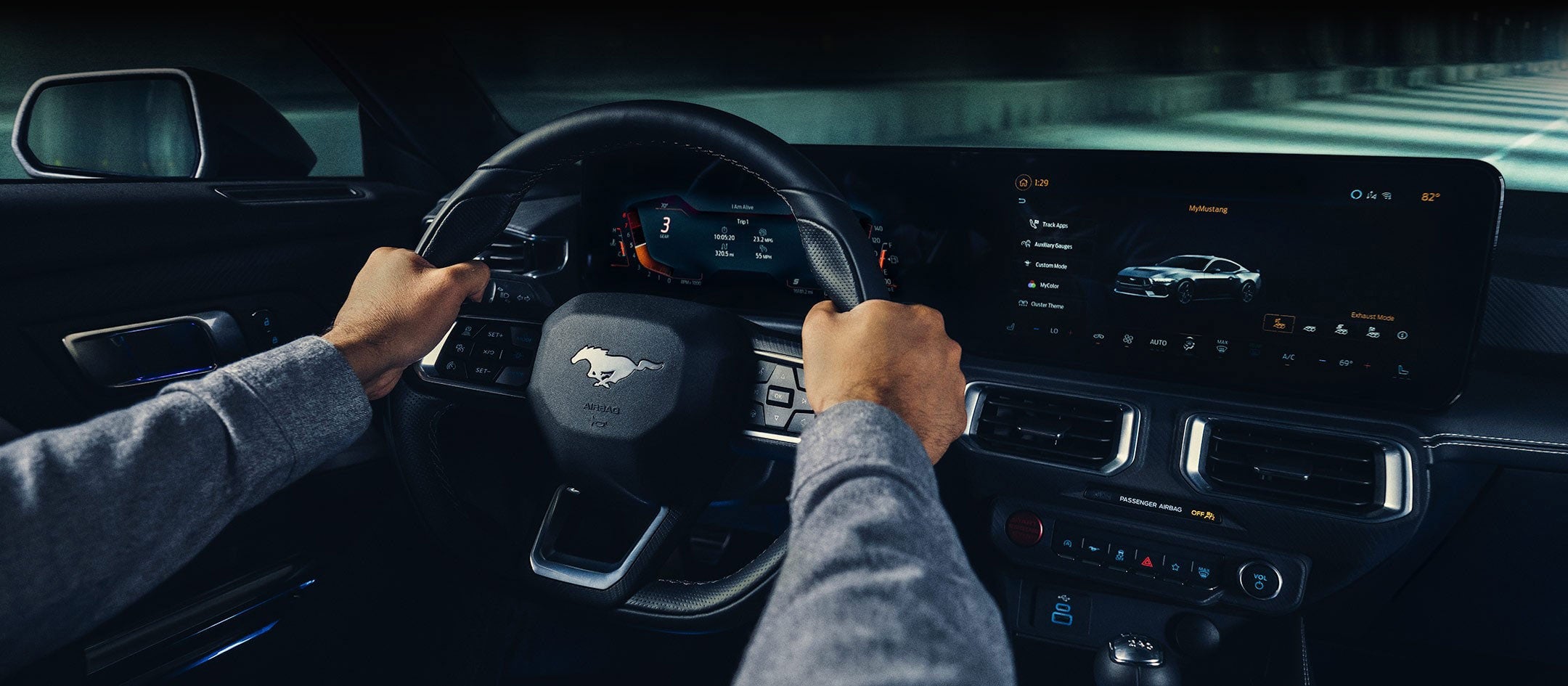 A 2024 Ford Mustang® model interior with a person driving | Coughlin Ford of Circleville in Circleville OH